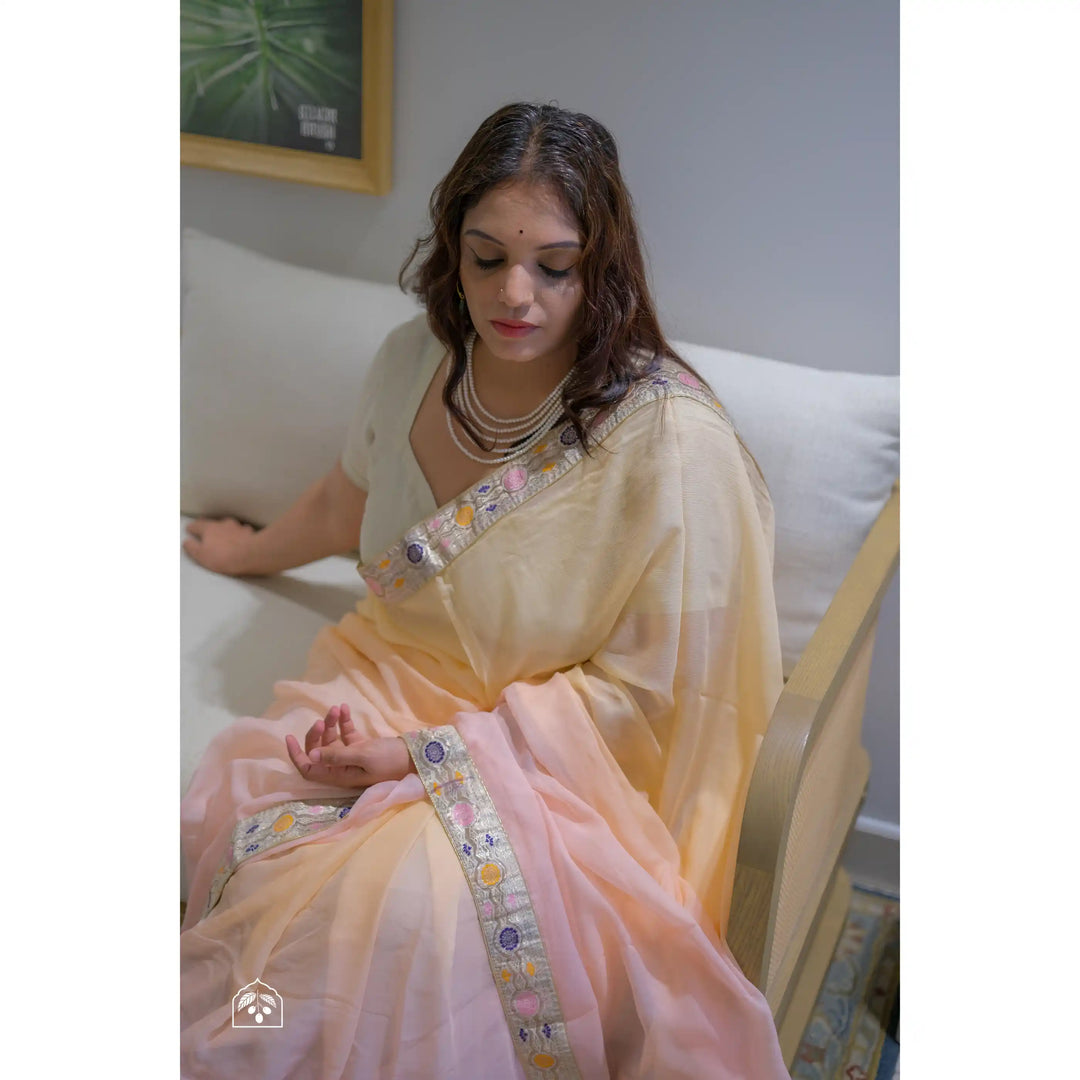 Saumya-Ivory-&-Peach-French-Chiffon-Saree-with-Antique-Banarasi-Border