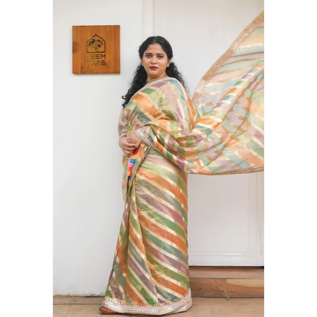 Sunstream-Tissue-Saree-with-Lehariya-Pattern-and-Hand-Embroidered-Borders